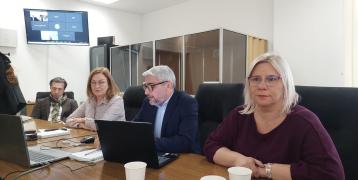 4 people at a stakeholders meeting